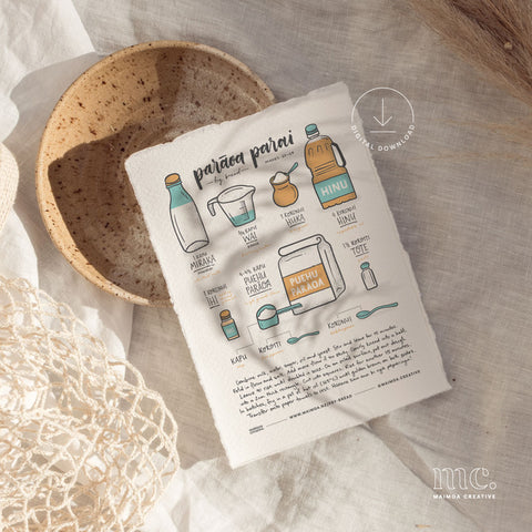 Flat-lay of Maimoa Creative’s illustrated parāoa parai (fry bread) recipe print, styled with natural textures as a digital download.