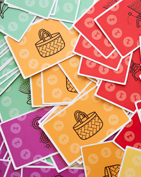 Colourful cards with kete illustrations and Māori-inspired icons