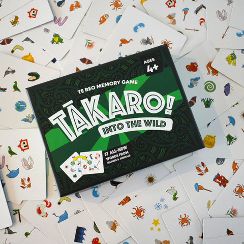 Tākaro! Into the Wild memory game box surrounded by cards with illustrations on a white background.