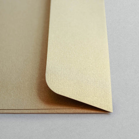 Closeup of gold foil envelope