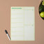 A3 green magnetic weekly planner with a whiteboard pen on a brown background