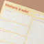Close up of a yellow magnetic weekly planner on a beige background