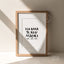 Framed print with Maori text 'Kia kaha te reo Māori ake ake ake' on a neutral background