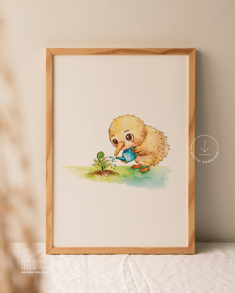 A framed print of a cute watercolour illustration of a fluffy kiwi chick gently watering a young fern frond