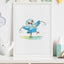 Framed watercolour illustration of a fluffy tūī chick happily swinging poi