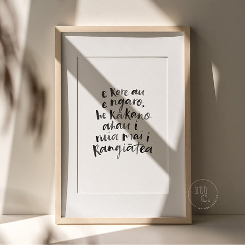 A4 Māori art print with handwritten quote “E kore au e ngaro...” framed and styled in a modern, natural home setting.