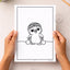 Two hand holding a colouring page of a korora penguin wearing a tīpare Māori headband and holding poi
