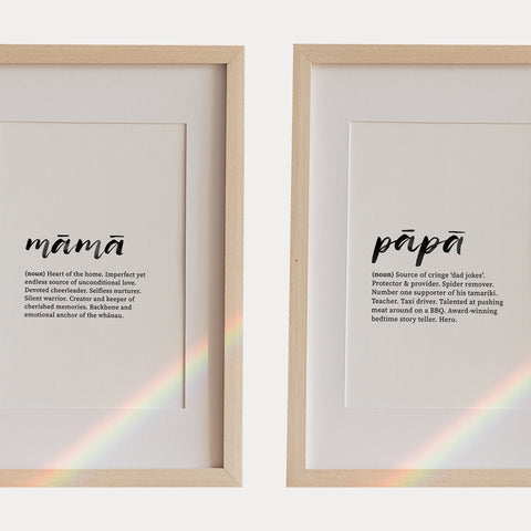 Framed prints defining "mama" and "papa" with heartwarming, humorous descriptions