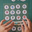 circle cutter tool cutting out small round routine cards in te reo Māori
