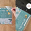 Laminating a children's reo Māōri routine flip chart with zoo animal illustrations